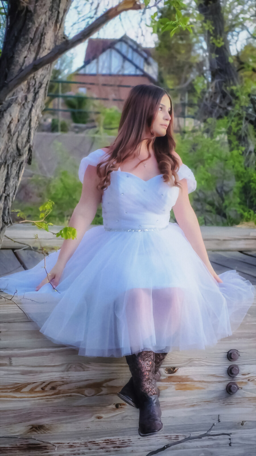 A senior portrait in soft daylight